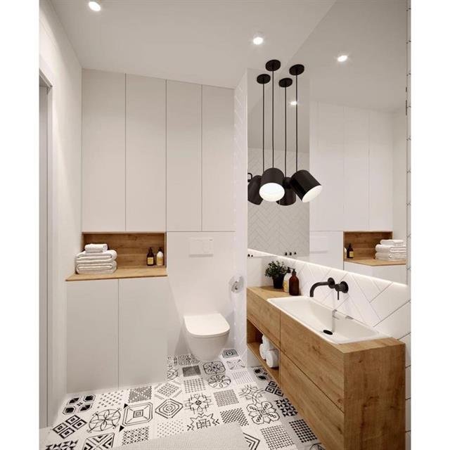 Wastafelmeubel met natuurstenen wasblad in een gerenoveerde badkamer