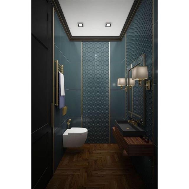 Badkamer met marmerlook tegelwerk op wand en vloer